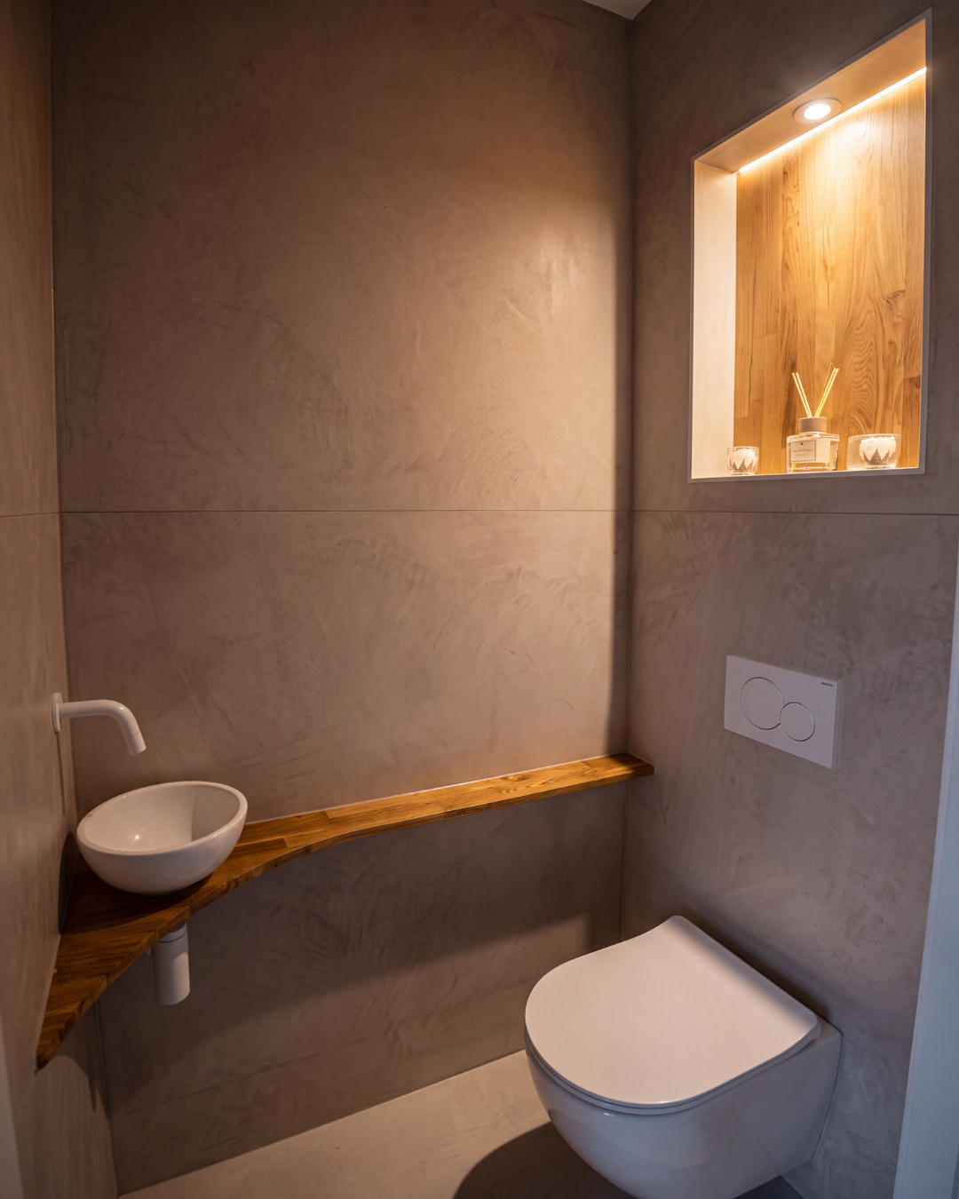 Afgewerkte toiletruimte na renovatie